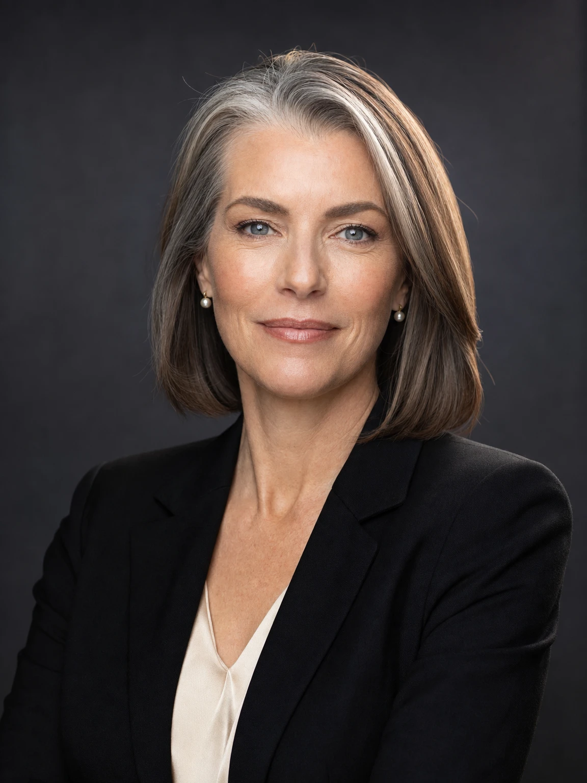 executive business headshot of a woman in her 50s